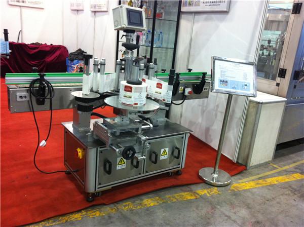 Hami-spanspek / draakvrugtesap om bottelplakkersetiketmasjien Drankveld